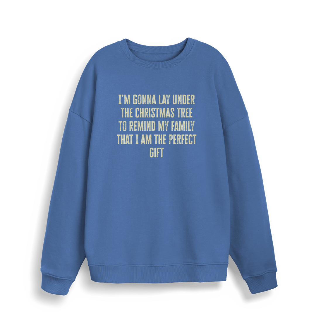 blue christmas sweater with the slogan 'im gonna lay under the christmas tree to remind my family that i am the perfect gift'