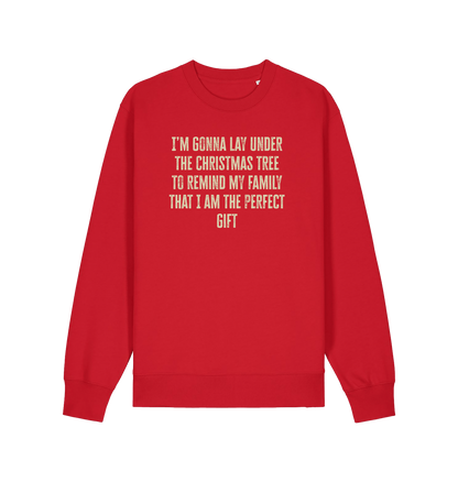 red christmas sweater with the slogan 'im gonna lay under the christmas tree to remind my family that i am the perfect gift'