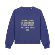 blue christmas sweater with the slogan 'i'm gonna lay under the christmas tree to remind my family that i am the perfect gift'