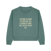 green christmas sweater with the slogan 'i'm gonna lay under the christmas tree to remind my family that i am the perfect gift'