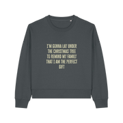 grey christmas sweater with the slogan 'i'm gonna lay under the christmas tree to remind my family that i am the perfect gift'