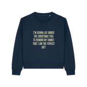navy christmas sweater with the slogan 'i'm gonna lay under the christmas tree to remind my family that i am the perfect gift'