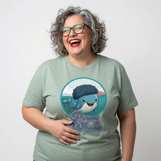 Woman with grey curly hair and glasses laughing while wearing a light green Perm Whale t-shirt, funny and cheeky ladies sperm whale graphic full of personality