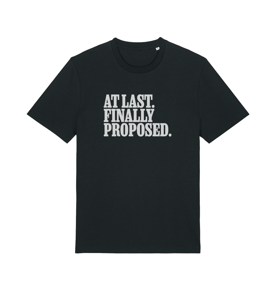 black matching t-shirt with the slogan 'at last finally proposed'