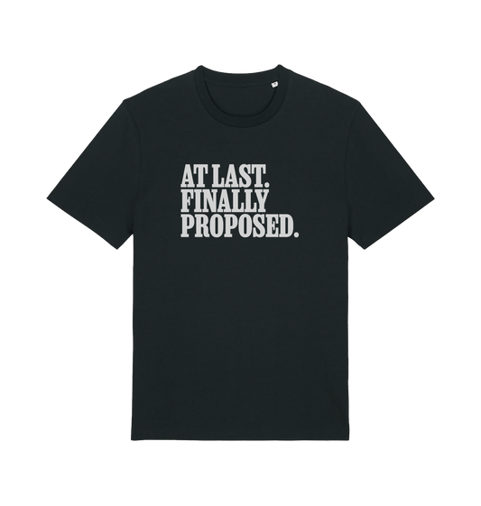 black matching t-shirt with the slogan 'at last finally proposed'