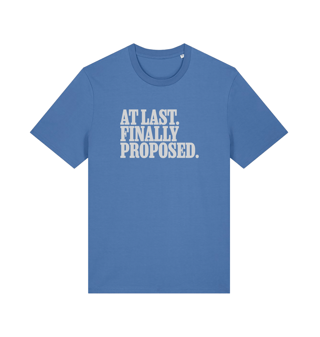 blue matching t-shirt with the slogan 'at last finally proposed'