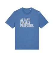 blue matching t-shirt with the slogan 'at last finally proposed'