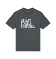 grey matching t-shirt with the slogan 'at last finally proposed'