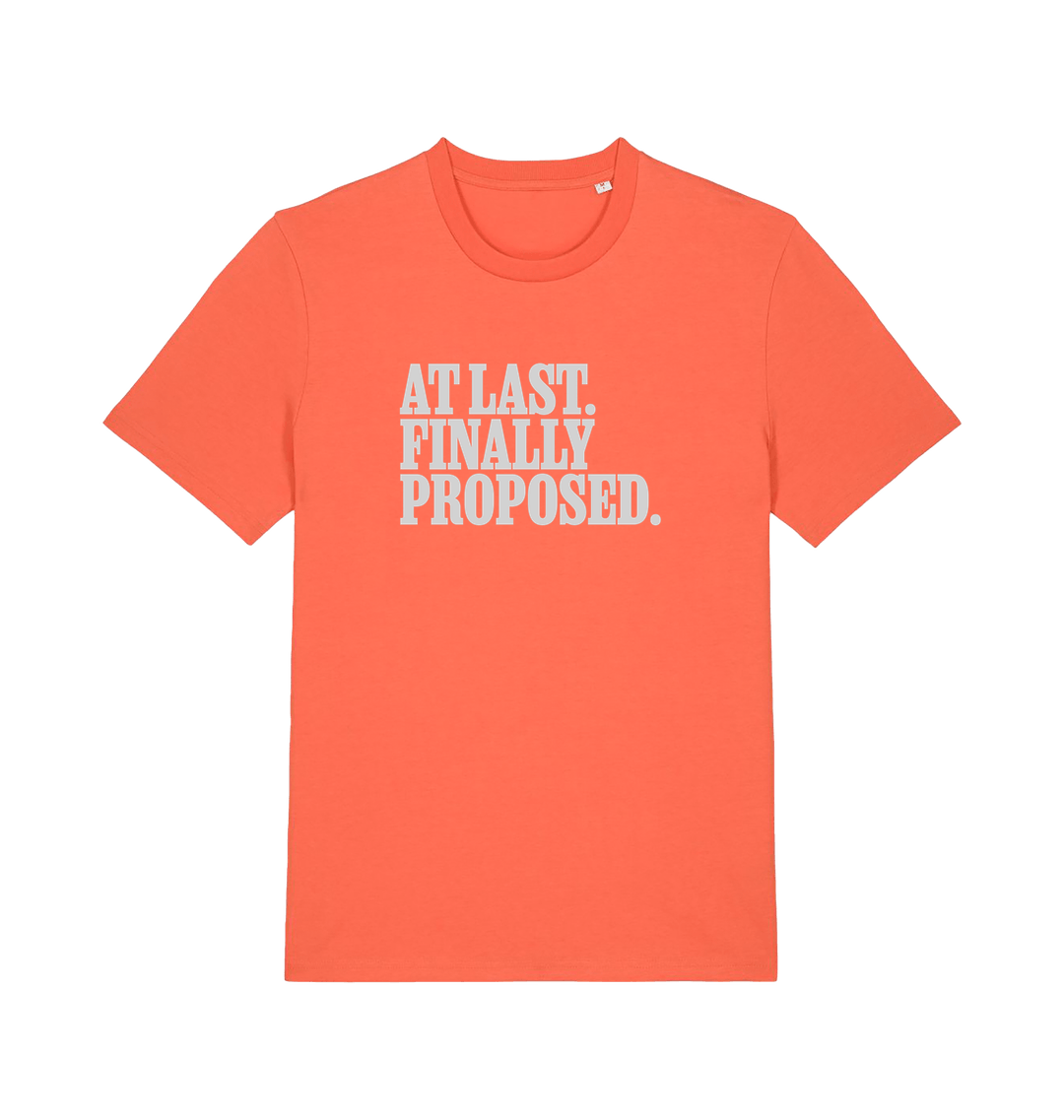 orange matching t-shirt with the slogan 'at last finally proposed'