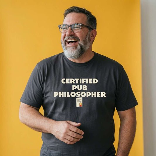 Bearded man with glasses laughing while wearing a black Certified Pub Philosopher t-shirt, funny mens local pub banter shirt full of pure wisdom
