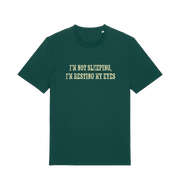 green slogan t-shirt with 'i'm not sleeping i'm resting my eyes'