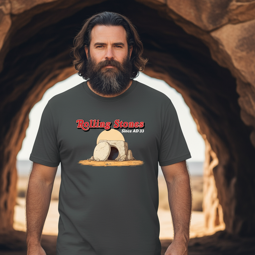 Man wearing a t-shirt with Rolling Stones logo in a desert setting