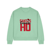 green womens christmas sweater with the slogan 'santa's favourite ho'