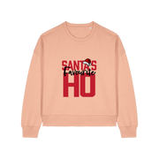 peach womens christmas sweater with the slogan 'santa's favourite ho'