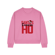 pink womens christmas sweater with the slogan 'santa's favourite ho'