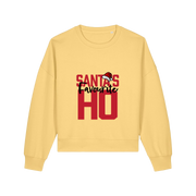 yellow womens christmas sweater with the slogan 'santa's favourite ho'