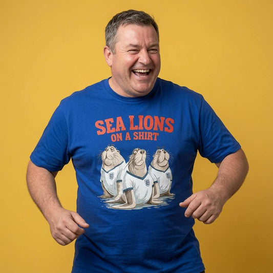 Man laughing while wearing a blue Sea Lions on a Shirt t-shirt featuring three sea lions in England football kits, witty mens England football pun
