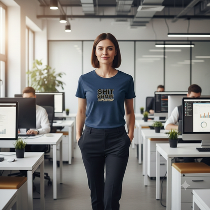 Woman wearing a blue t-shirt with text in an office setting