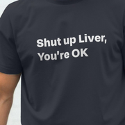 Black slogan t-shirt with a white drinking slogan 'Shut up Liver, You're OK' on a plain background