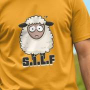 Yellow funny t-shirt with a cartoon sheep and 'S.I.L.F.' text on a grassy background