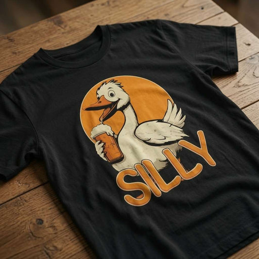 Black Silly Goose t-shirt laid flat on a wooden surface showing the complete goose and beer graphic, witty mens cheeky goose pub banter design that every drinking lad will claim