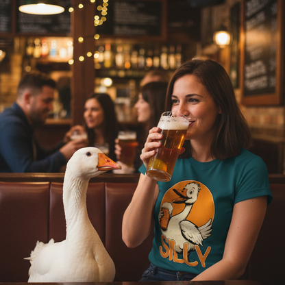 Woman drinking beer in a bar with a goose whilst wearing a teal coloured t-shirt with a goose design
