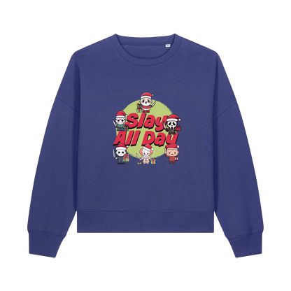 blue christmas jumper with the graphic of santa with some popular horror movie characters and the slogan 'slay all day'