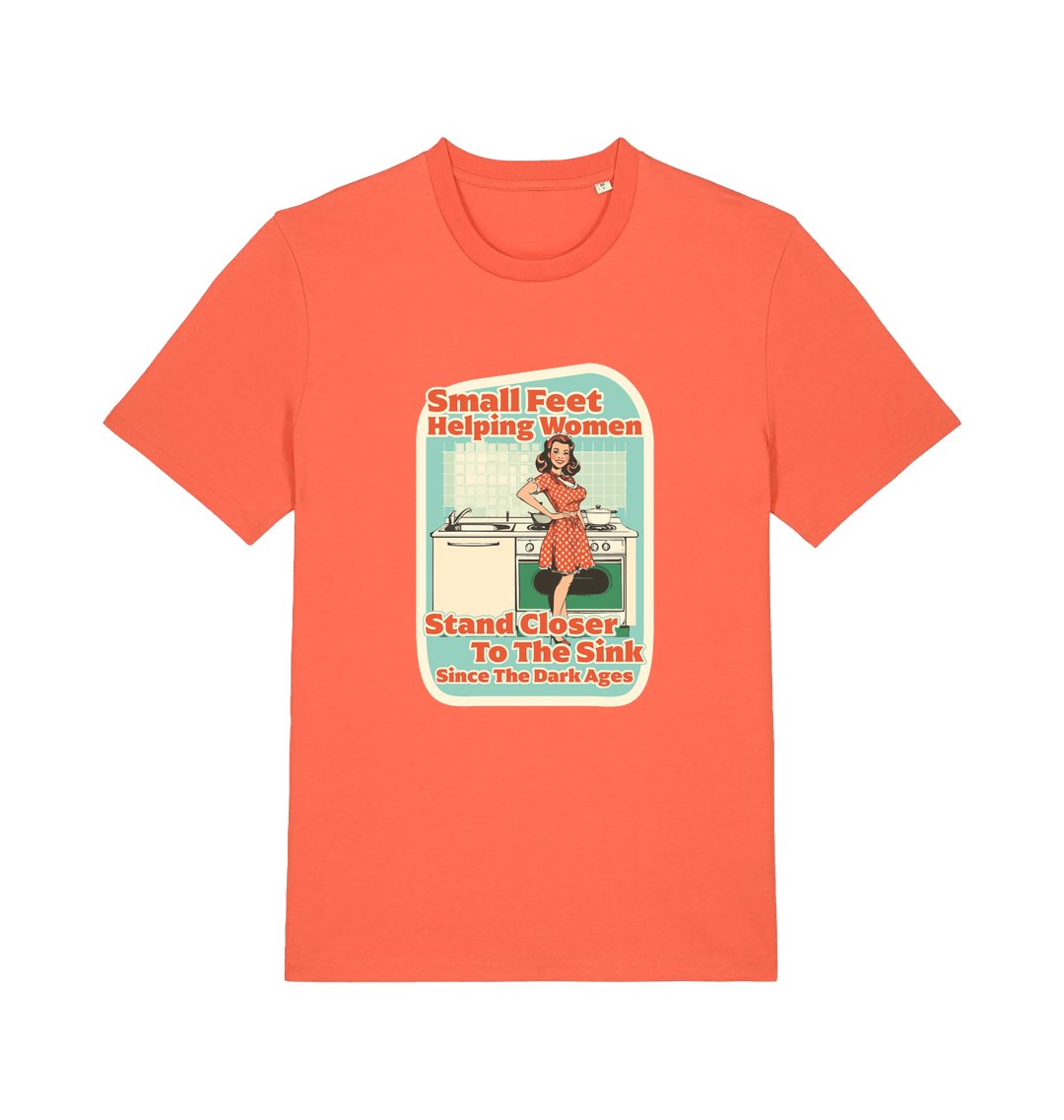 orange funny offensive t-shirt with the graphic of a retro housewife stood in a kitchen and the slogan 'small feet helping women stand closer to the sink since the dark ages'