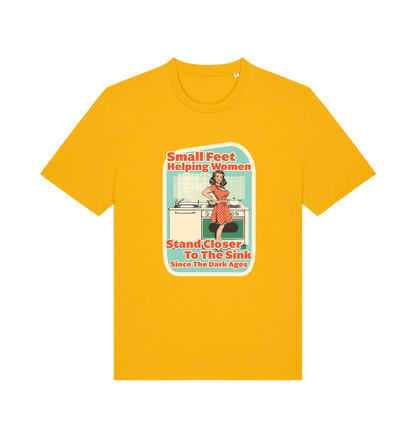 yellow funny offensive t-shirt with the graphic of a retro housewife stood in a kitchen and the slogan 'small feet helping women stand closer to the sink since the dark ages'