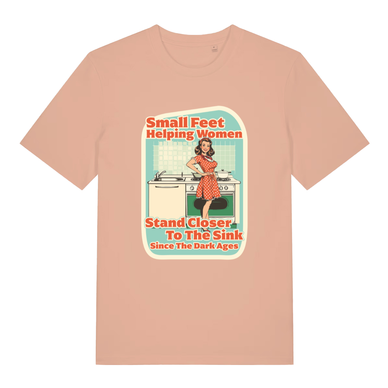 peach women's funny offensive t-shirt with the graphic of a retro housewife stood in a kitchen and the slogan 'small feet helping women stand closer to the sink since the dark ages'