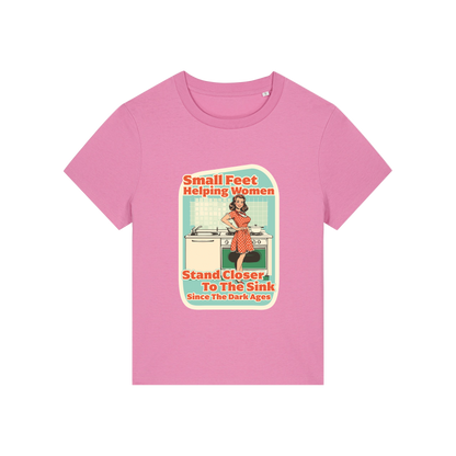 pink funny offensive t-shirt with the graphic of a retro housewife and the slogan 'small feet helping women stand closer to the sink since the dark ages'