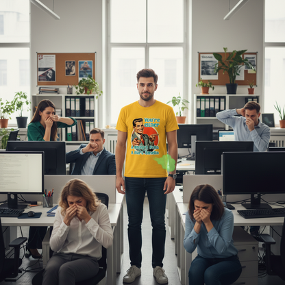 Person in a yellow shirt standing in an office with colleagues around