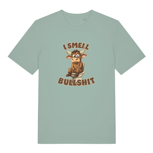 light green funny t-shirt with the graphic of a cartoon bull sat on the toilet and the slogan 'i smell bullshit'