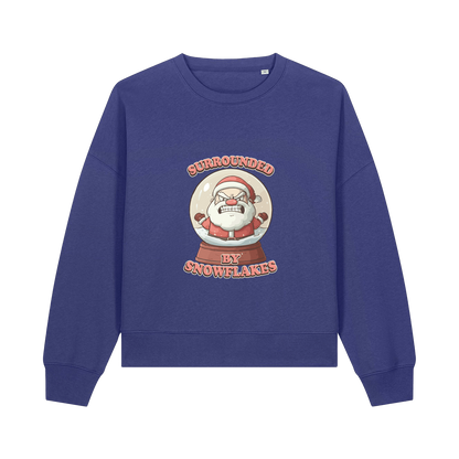 blue christmas sweater with the graphic of santa inside a snowglobe and the slogan 'surrounded by snowflakes'