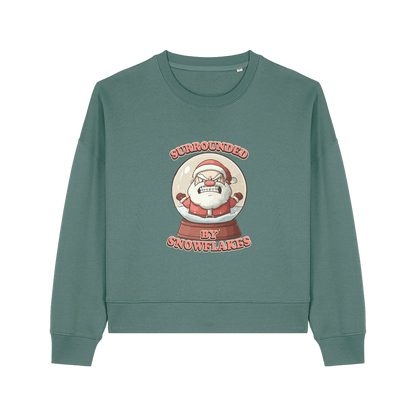 green christmas sweater with the graphic of santa inside a snowglobe and the slogan 'surrounded by snowflakes'