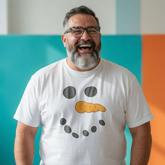 Man laughing while wearing a white Snowman Face t-shirt, funny mens snowman festive design full of pure attitude