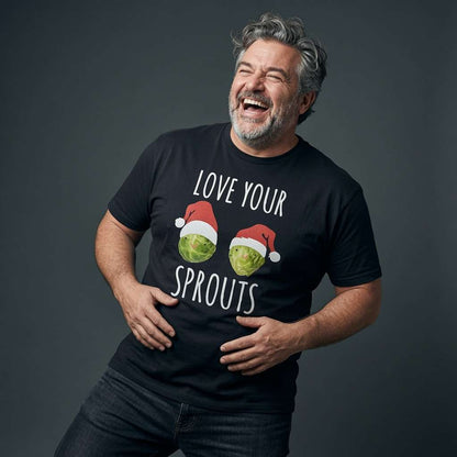 Grey-haired man laughing while holding his stomach in a black Love Your Sprouts t-shirt, funny mens festive sprouts graphic full of pure attitude