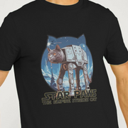 Black cat t-shirt with a cat and AT-AT walker design, text 'Star Paws: The Empire Strikes Cat' on a plain background.