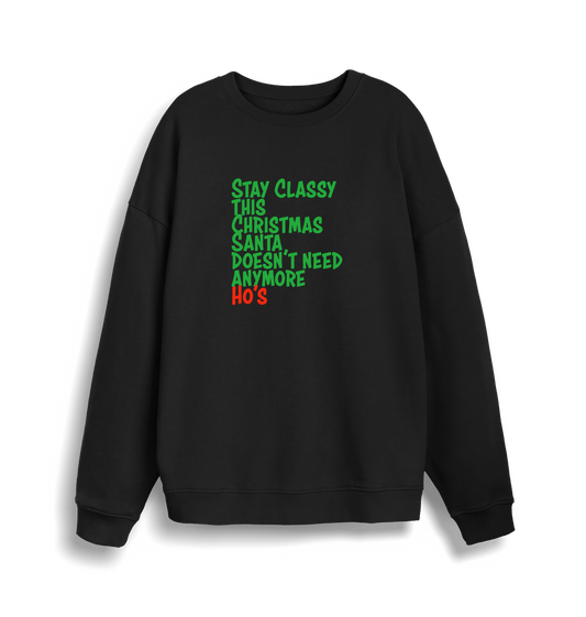 black christmas sweater with the slogan 'stay classy this christmas santa doesn't need anymore ho's'