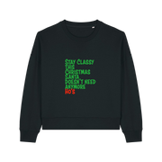 black christmas sweater with the slogan 'stay classy this christmas santa doesn't need anymore ho's'