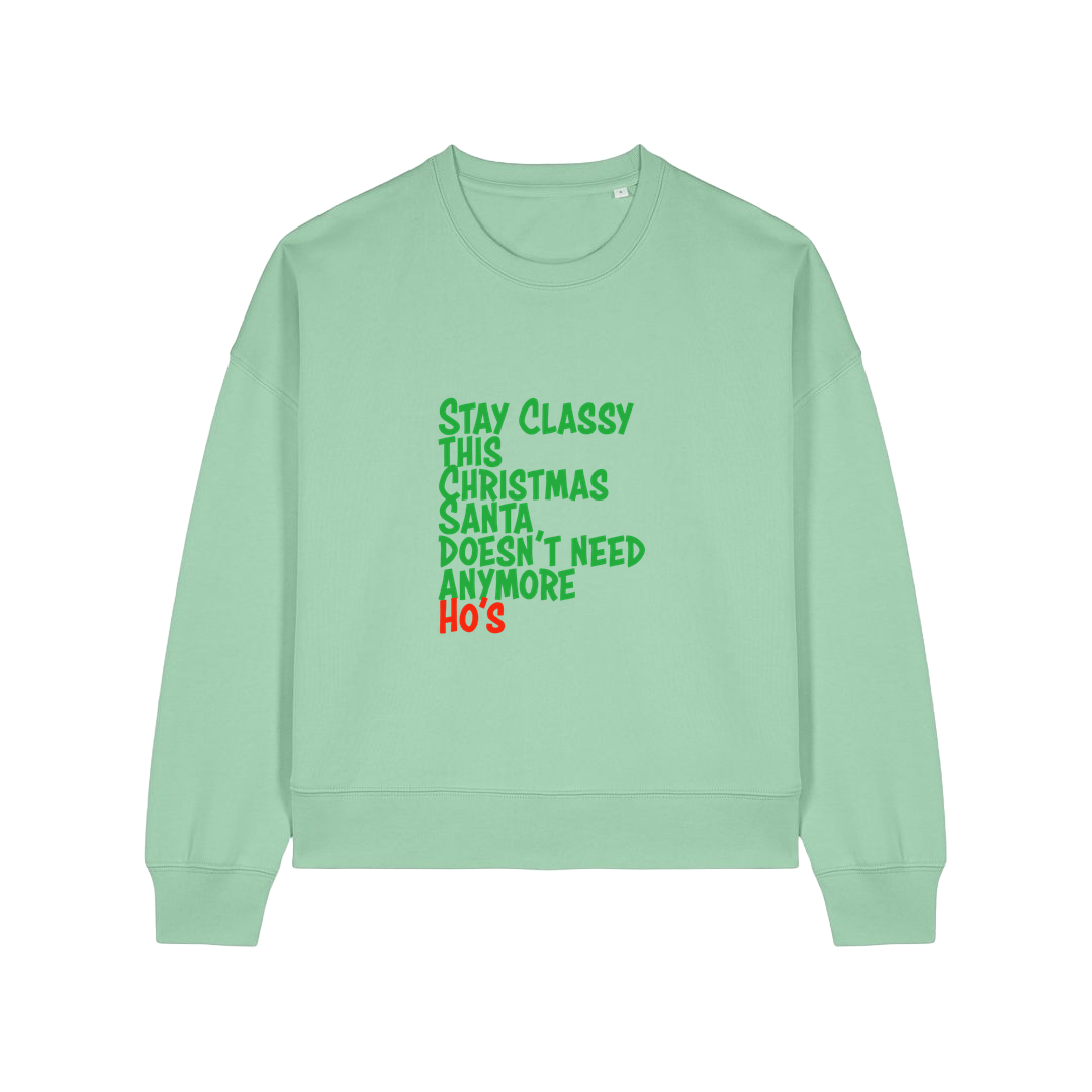 green christmas sweater with the slogan 'stay classy this christmas santa doesn't need anymore ho's'
