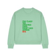 green christmas sweater with the slogan 'stay classy this christmas santa doesn't need anymore ho's'