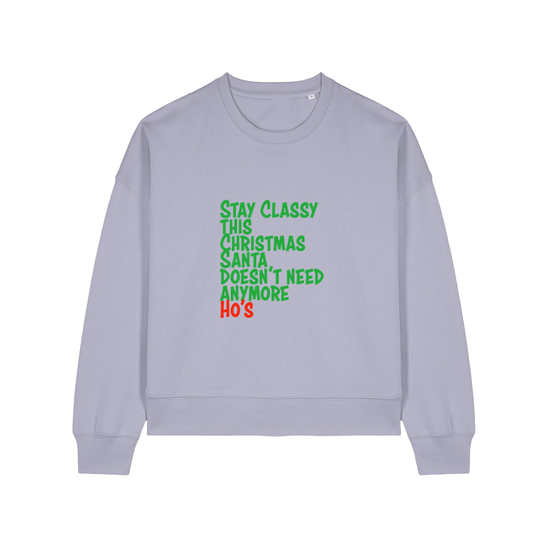 lavender christmas sweater with the slogan 'stay classy this christmas santa doesn't need anymore ho's'