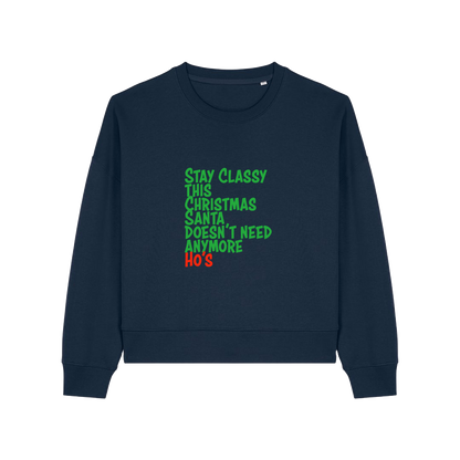 navy christmas sweater with the slogan 'stay classy this christmas santa doesn't need anymore ho's'