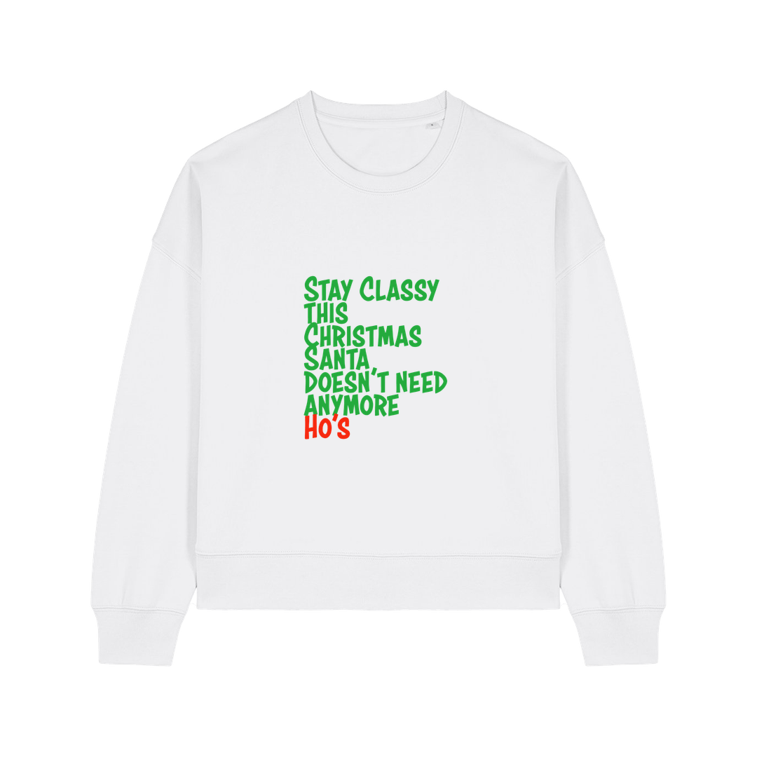 white christmas sweater with the slogan 'stay classy this christmas santa doesn't need anymore ho's'