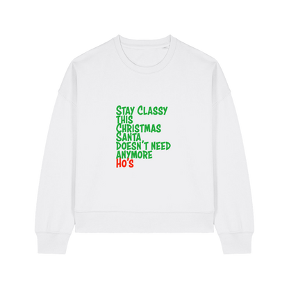 white christmas sweater with the slogan 'stay classy this christmas santa doesn't need anymore ho's'
