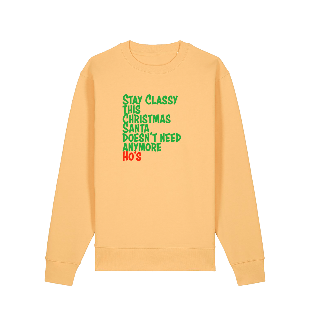 yellow christmas sweater with the slogan 'stay classy this christmas santa doesn't need anymore ho's'