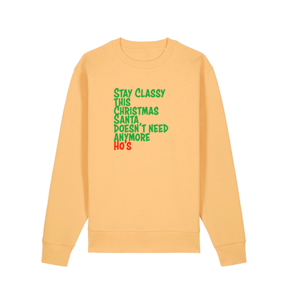 yellow christmas sweater with the slogan 'stay classy this christmas santa doesn't need anymore ho's'
