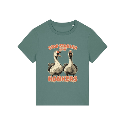 green graphic t-shirt with the graphic of two geese and the slogan 'stop staring at my honkers'