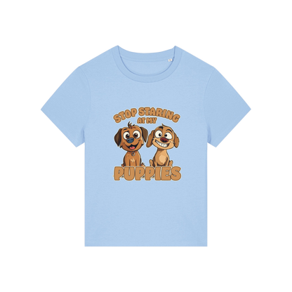 light blue funny animal t-shirt with the graphic of two puppies and the slogan 'stop staring at my puppies'
